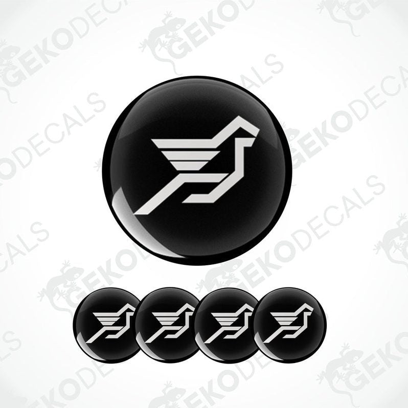 A set of four black vinyl stickers with the HAMANN brand logo and a bird symbol on them.