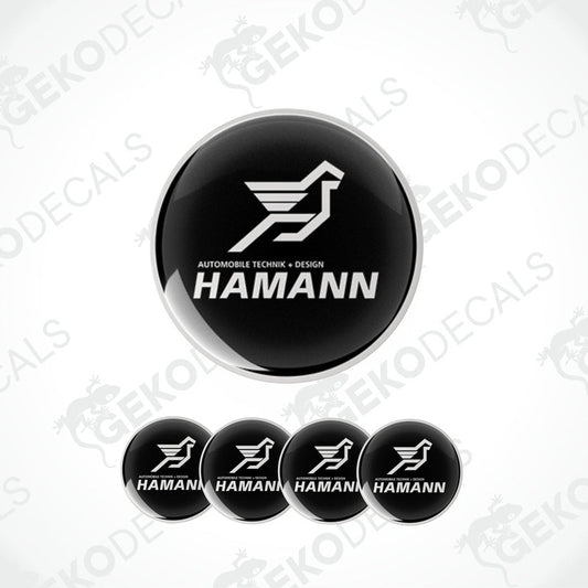 Set of five black vinyl decals with the HAMANN logo, designed for use as car wheel caps or stickers.