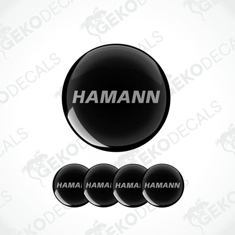 Set of four black round car decals with the HAMANN logo in the center.
