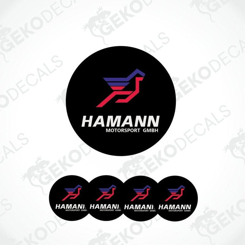 A set of four black vinyl stickers with red and blue geometric designs, featuring the brand name 'HAMANN' and the text 'Motorsport GMBH'.