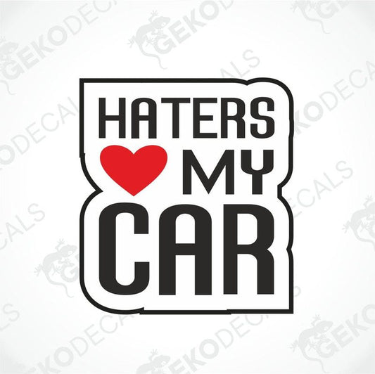 A black and white car sticker with the text 'HATERS MY CAR' and a red heart symbol.