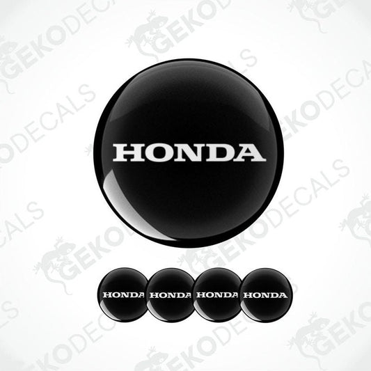 A set of four white and red vinyl decals with the HONDA logo.