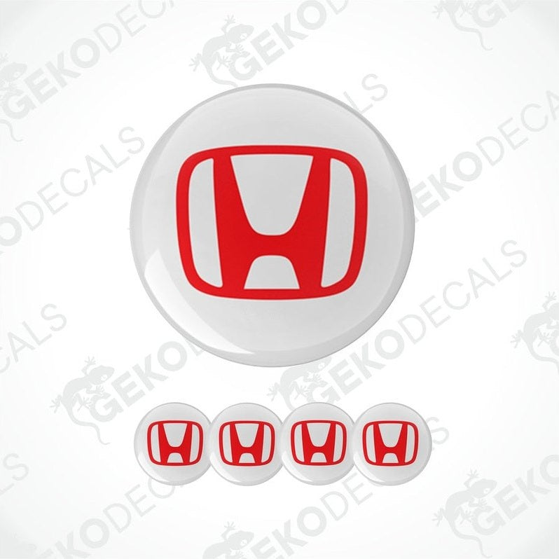 A set of four white vinyl stickers with the Honda logo in red, intended for use as car decals.
