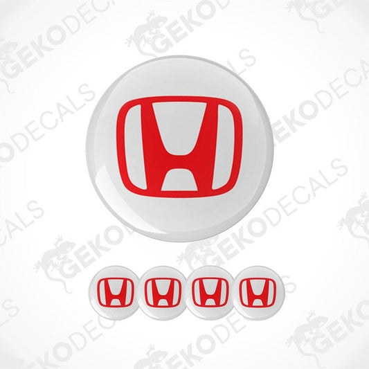 A set of four white vinyl stickers with the Honda logo in red, intended for use as car decals.