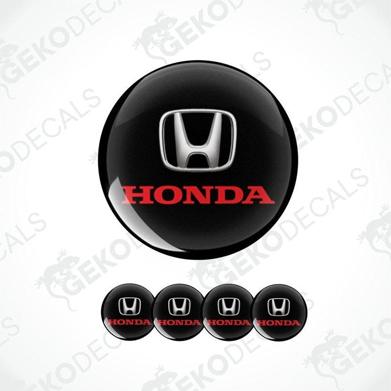A set of black vinyl decals with the Honda logo in red and silver.