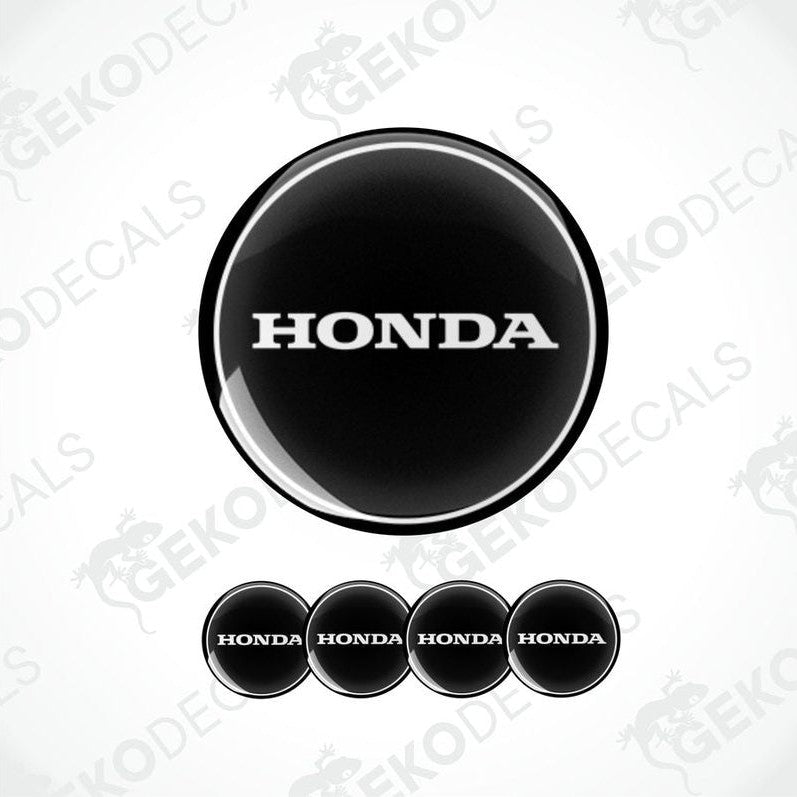 A set of four white and red vinyl decals with the HONDA logo.