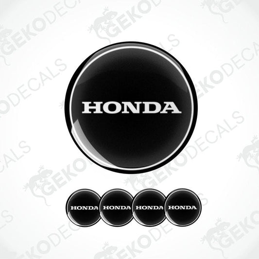A set of four white and red vinyl decals with the HONDA logo.