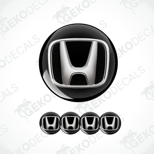 A set of black vinyl decals with the HONDA logo, designed for use as car wheel caps and stickers.