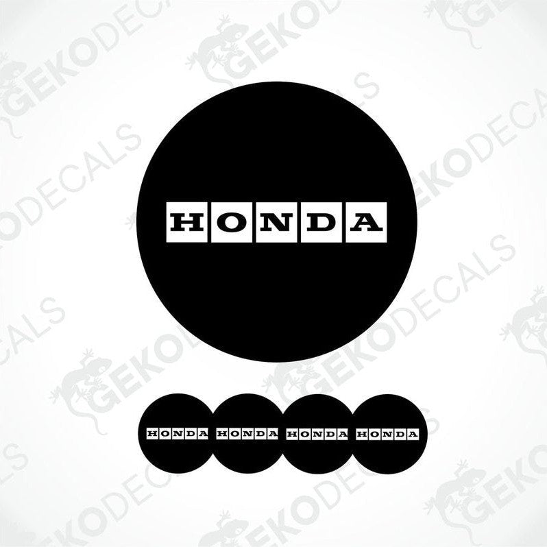 A set of black vinyl decals with the HONDA logo, including one large round decal and four smaller rectangular ones.