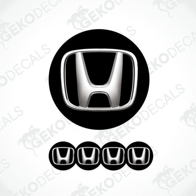 A set of black vinyl decals with the HONDA logo, designed for use as car wheel caps and stickers.