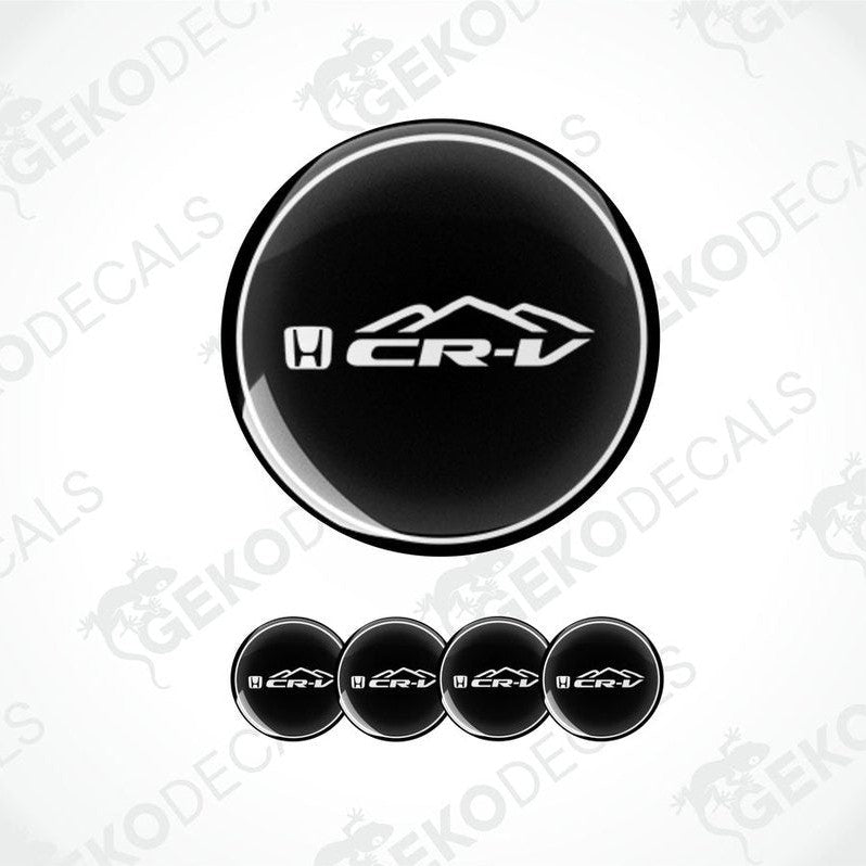 A set of black vinyl decals with the HONDA CR-V logo, including four round decals and one with a mountain range silhouette.