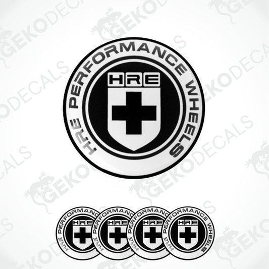 A set of four vinyl decals with a polyurethane coating featuring a circular design with the text 'HRE PERFORMANCE WHEELS' and a cross emblem.