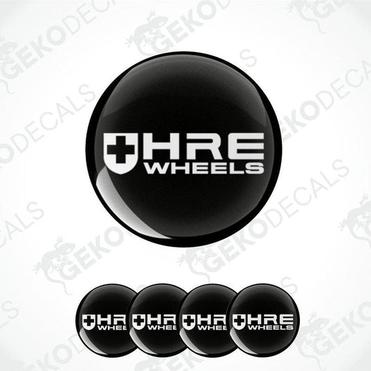 A set of four black vinyl stickers with the HRE Performance Wheels logo, which includes a cross and the brand name.