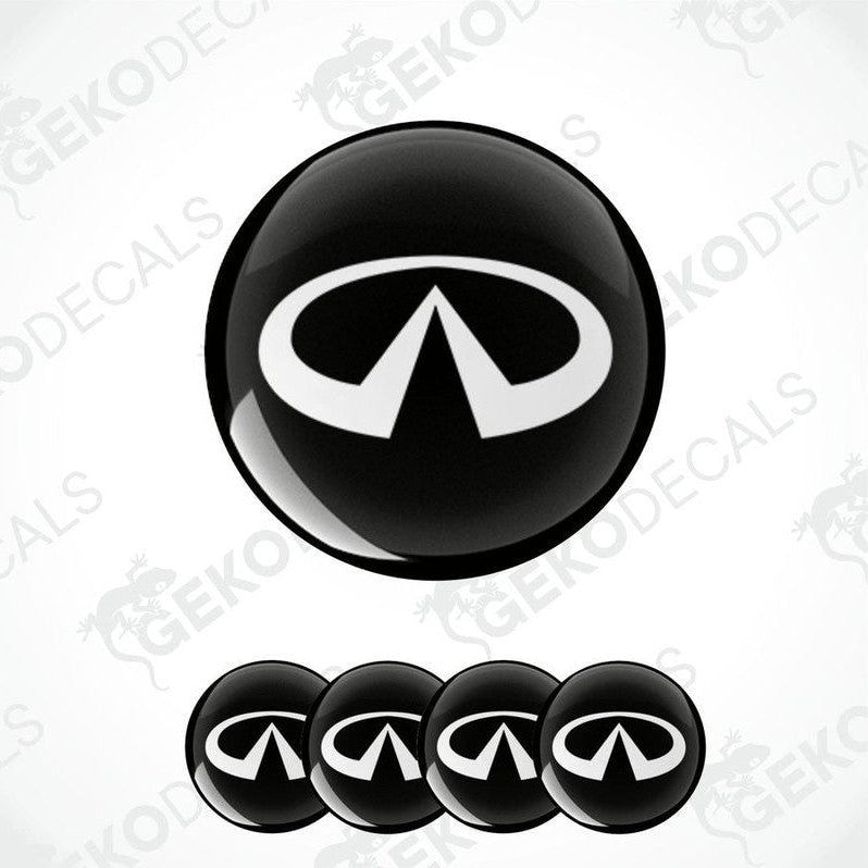 A set of four black vinyl stickers with a white INFINITI logo on each.