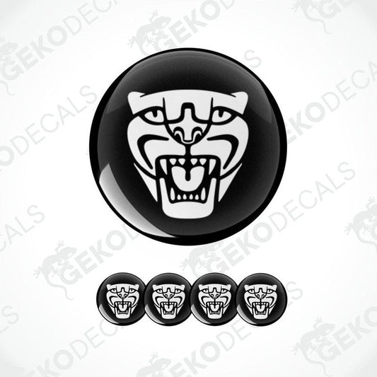 A set of four black vinyl stickers with a white jaguar decal design, displayed against a white background.