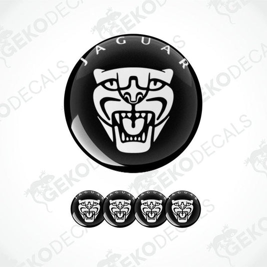 A set of black and white vinyl decals with a Jaguar logo, including four dome-shaped stickers.
