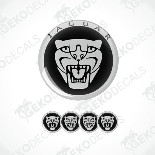 A set of four black and white vinyl decals with the Jaguar logo.