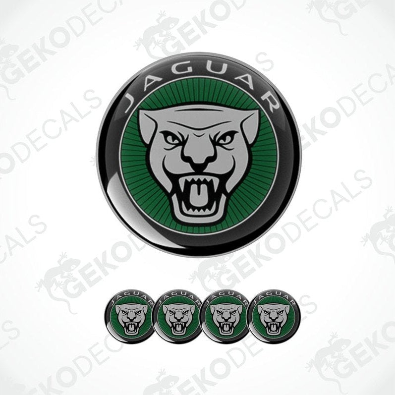 A set of four green and black vinyl stickers with a Jaguar logo design, displayed on a white background.