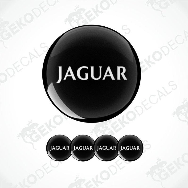 A set of black vinyl decals with the word 'JAGUAR' written in white letters, including four different designs.