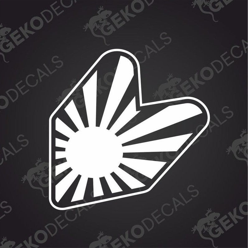 A decal with a white design featuring a stylized sun or sunburst motif, representing a car sticker.