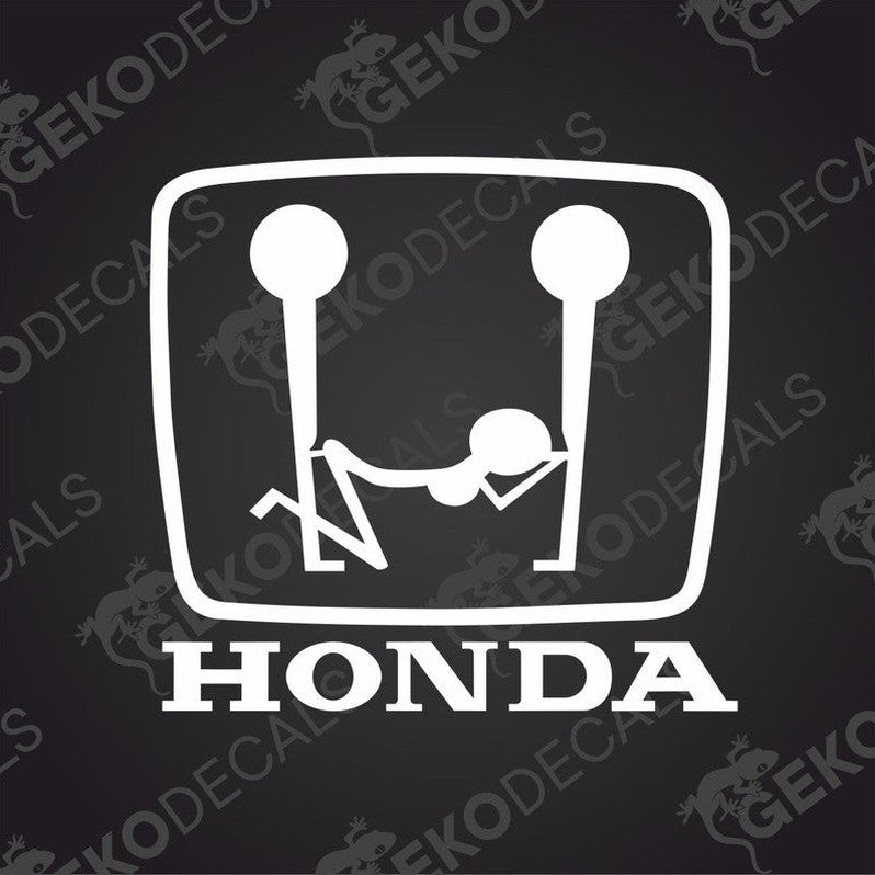 Image of two men and a woman the Honda text under