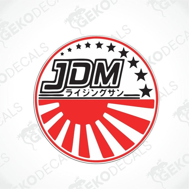 A red, white, and black car decal with the letters 'JDM' in the center and a graphic of rising sun stars around it.