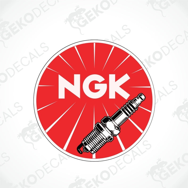 A red, white, and black car decal with the brand 'NGK' along with an illustration of a spark plug.