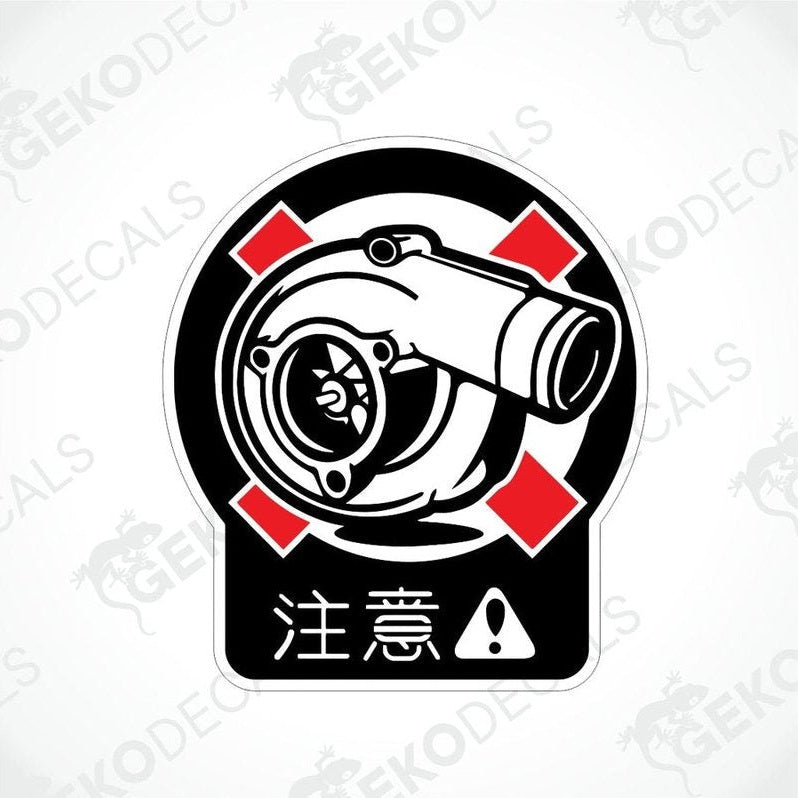 A turbo symbol in red, white and black decal design with hieroglyphs.