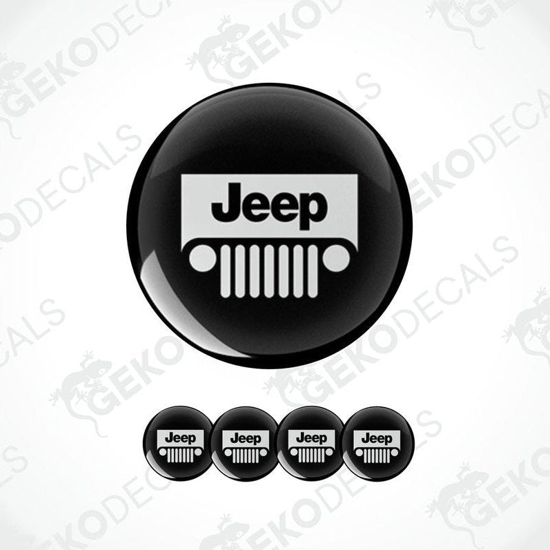 A set of four black vinyl stickers with a JEEP logo design, displayed on a white background.