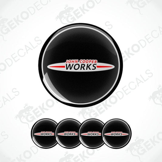 Set of four round car decals with 'John Cooper Works' branding, predominantly black with white and red text.