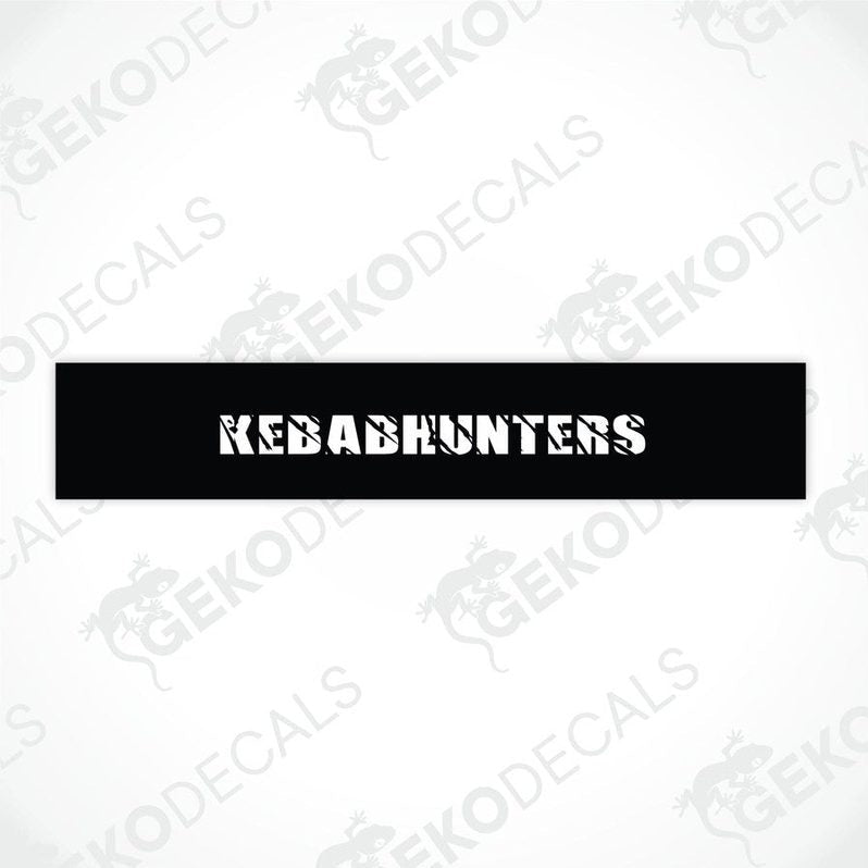 Black car windshield sun visor with white text KEBABHUNTERS