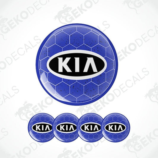 A set of four blue vinyl decals with the KIA logo, designed for use as car wheel caps.