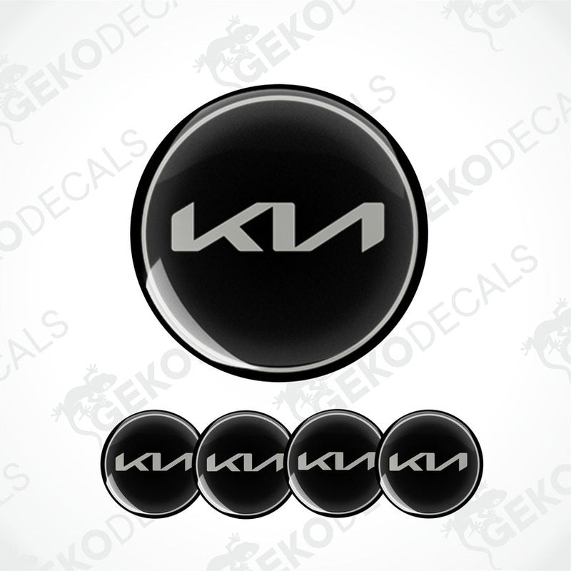 A set of four black vinyl decals with the KIA logo.
