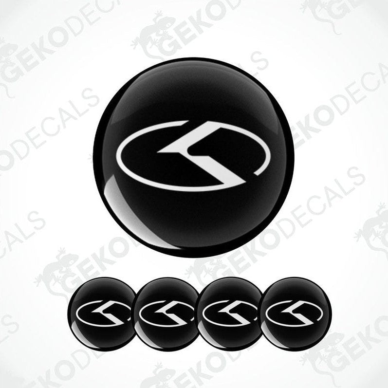 A set of four black vinyl stickers with a dome shape and the KIA brand logo in the center.