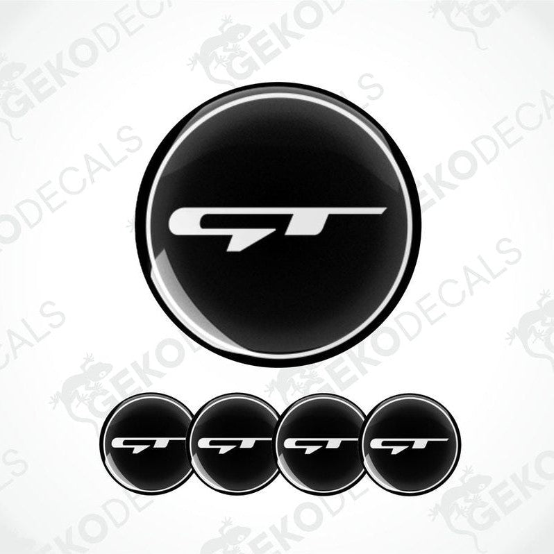 A set of four black vinyl stickers with a KIA GT logo, designed for use as car decals.
