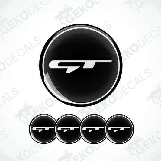 A set of four black vinyl stickers with a KIA GT logo, designed for use as car decals.