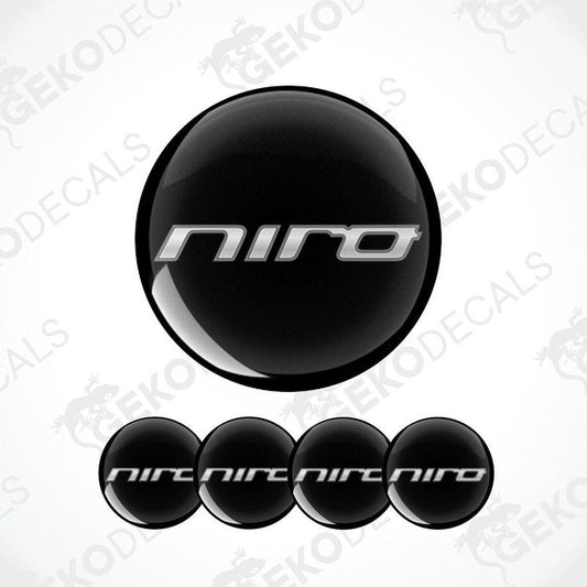 A set of four black vinyl stickers with the word 'KIA NIRO' and a geometric design.