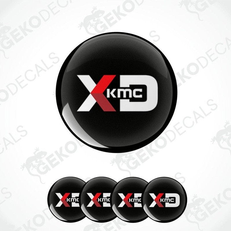 A set of four black vinyl decals with the polyurethane coating, featuring the 'KMC XD' logo in white.