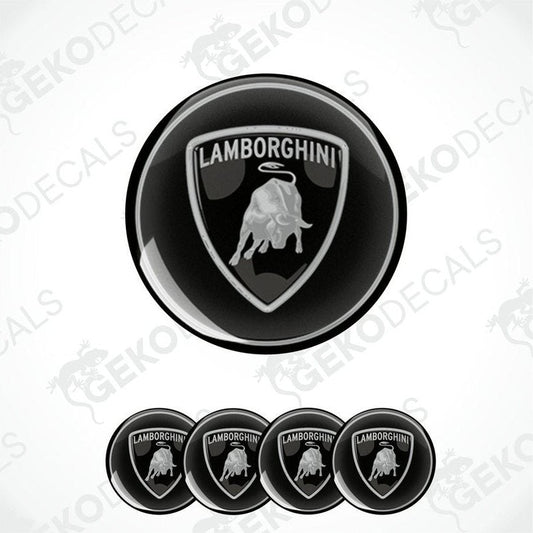 A set of four black vinyl decals with the Lamborghini logo, which includes a depiction of a bull's head inside a shield.