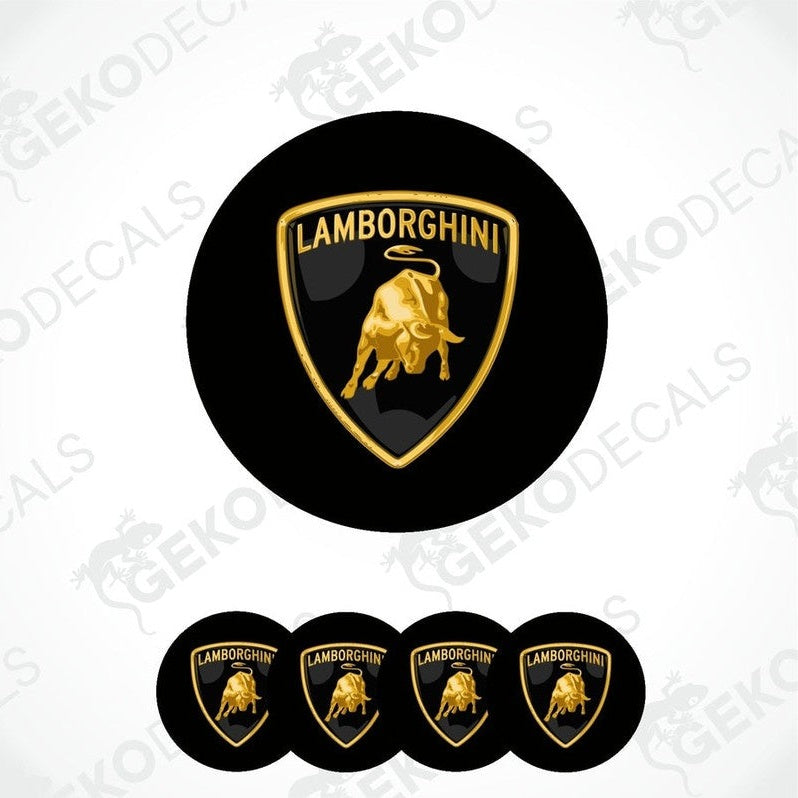 A set of four black vinyl stickers with the Lamborghini logo in gold, displayed on a white background.