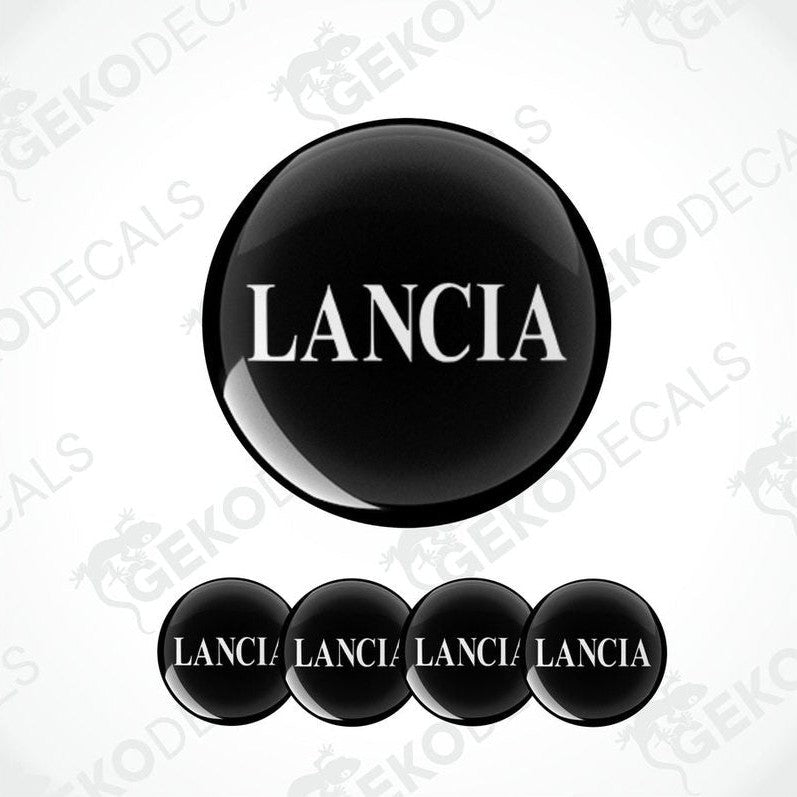 A set of four black vinyl stickers with the word 'LANCIA' printed on each, arranged in a circular pattern with a white background.