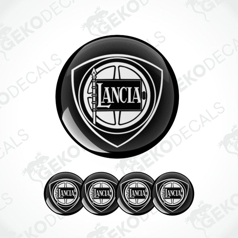 A set of four black vinyl stickers with the LANCIA brand logo, designed in the shape of a basketball.