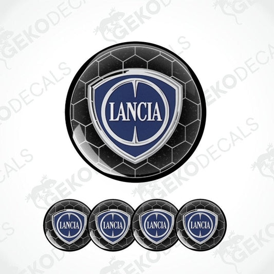 A set of four black vinyl stickers with the LANCIA brand logo in white and blue.