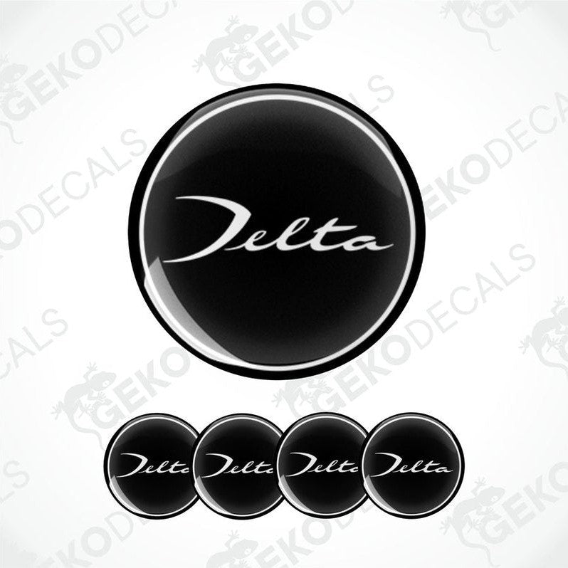 Set of four black vinyl decals with the text 'LANCIA Delta' on them, presented against a white background.