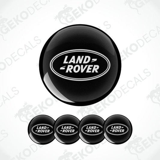 A set of four black vinyl stickers with the 'LAND ROVER' text embossed on them, displayed against a white background.