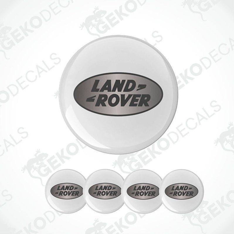 Set of four white round car decals with the LAND ROVER logo in the center.