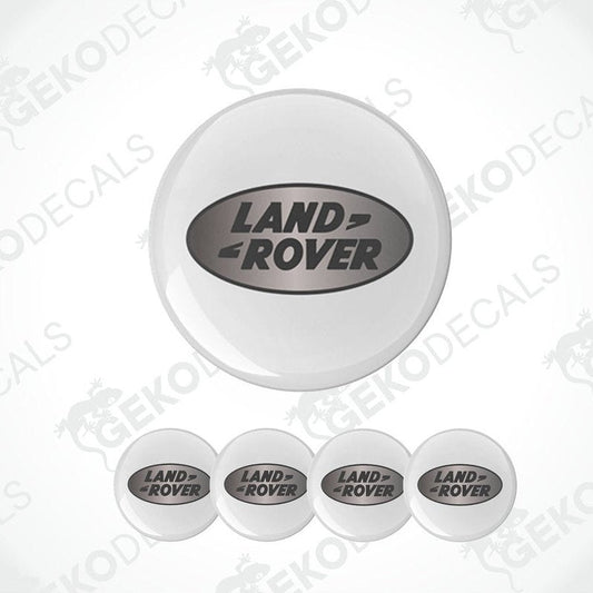 Set of four white round car decals with the LAND ROVER logo in the center.
