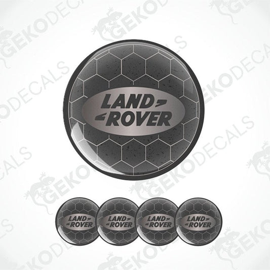 A set of four black vinyl stickers with the 'LAND ROVER' text embossed on them, displayed against a white background.