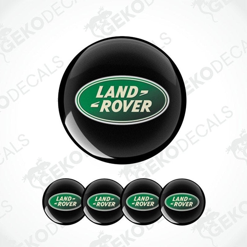 A set of four vinyl decals with polyurethane coating featuring the Land Rover logo, displayed on a white background.