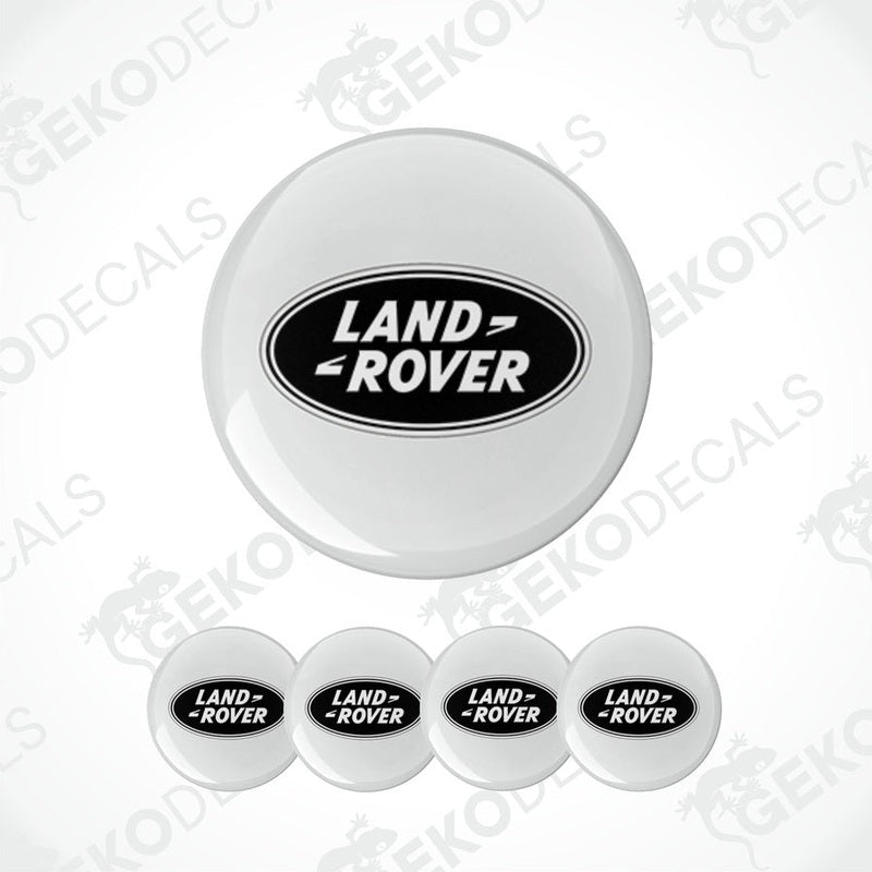 A set of four round car decals with the Land Rover logo in black on a white background.